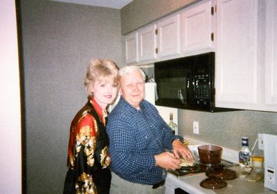 LaVonne Danielson in the kitchen with an older man