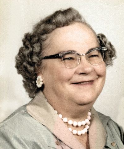 Restored and colorized (AI-assisted); faces are the original photo, colours are a best guess. "Lizzie" — Liessi Ladusch Kretschmar, portrait in later life.